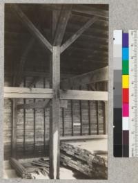 Douglas fir timbers. The view shows timbers used in a lumber shed of a sugar pine lumber company at Pinedale, California. The shed was built about 1922, and soon thereafter the timbers showed a tendency to twist. The joints are mortise and tenon and wooden pins were used for fastenings. The picture shows two horizontal members badly twisted. Both are boxed hearts. See also #4074. March 1929, E.F