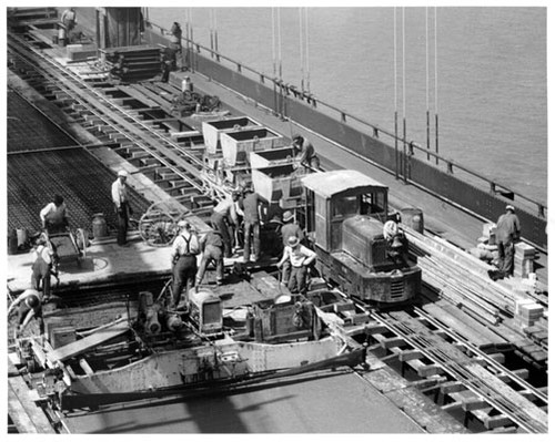 [Bridge workers on the deck of the San Francisco-Oakland Bay Bridge]