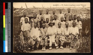 Missionary with assembled men, Gabon, ca.1920-1940