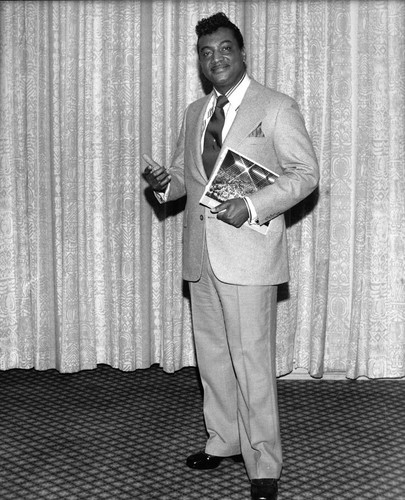 Reverend Ike posing backstage, Los Angeles. ca. 1977