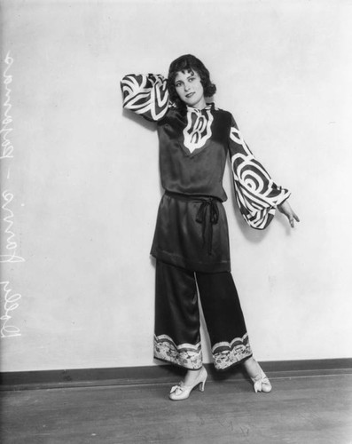 Dolly Jarvis in pajamas poses for the camera, view 1