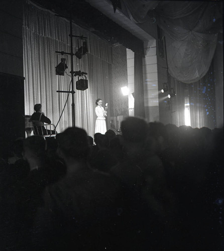 Unidentified singer during USO show at Fort Ord