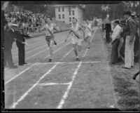 Dick Pollard of Pomona College noses out Mel Caldwell of Occidental College to win the 880-yard race during a dual track meet, Los Angeles, 1932
