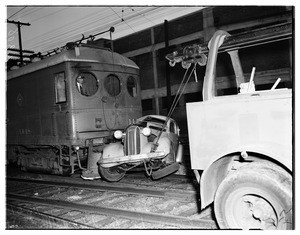 Auto vs. Pacific Electric mail car (Long Beach and Newton), 1951