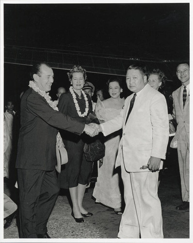 Alfred and Mrs. Wallenstein with President Magsaysay in Manila