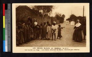 Children receiving medals, Senegal, ca.1920-1940