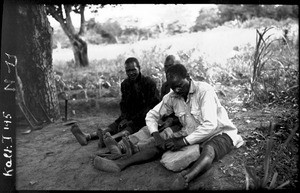 Knife grinder, Mozambique, ca. 1933-1939