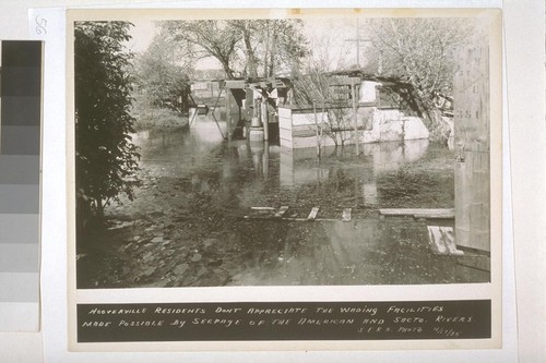Hooverville residents don't appreciate the wading facilities made possible by seepage of the American and Sacto. [Sacramento] Rivers. S.E..R.A. Photo, 4/17/35