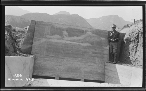 A man standing at the siphon spillway at Kaweah #3 Hydro Plant