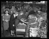 Opening of Ralph's Market: view inside the store of vegetable area with shoppers in Los Angeles, Calif , 1941