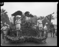 Float with trumpeters and floral eagle in the Tournament of Roses Parade, Pasadena, 1928