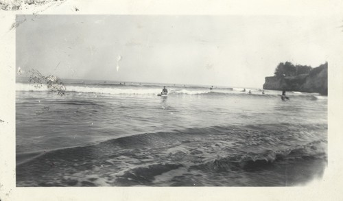 Unidentified surfers at Cowell Beach