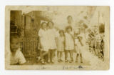 [Photograph of the Sakai family and friends]