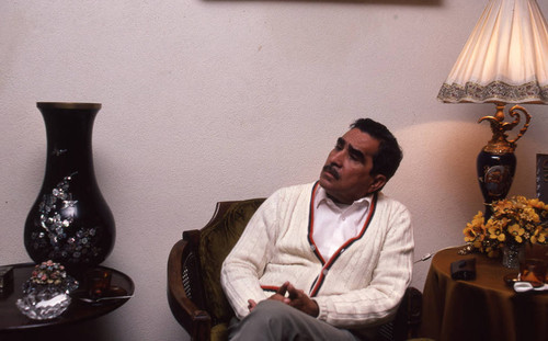 Presidential candidate Mario Sandoval Alarcón sitting at his home, Guatemala City, 1982