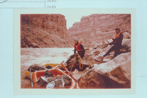 Jorgen Visbak and Buzz Belknap lining their Yaks thru Dark Canyon Rapid