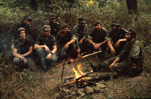 Survival school students at a campfire, Liberal, 1982