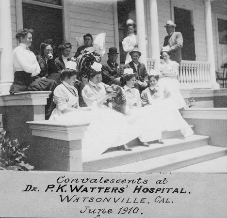 Staff and patients on the steps of the Dr. P. K. Watters' Hospital