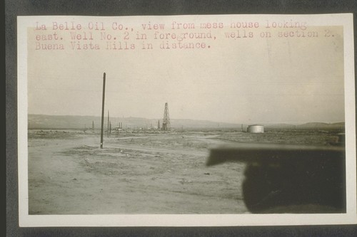 La Belle Oil Company, view from mess house looking east.Well number two in foreground, wells on section two. Buena Vista Hills in distance