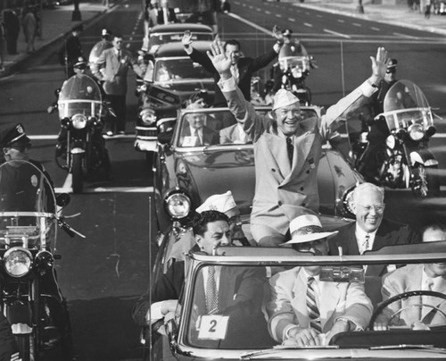 Eisenhower and Nixon ride in parade