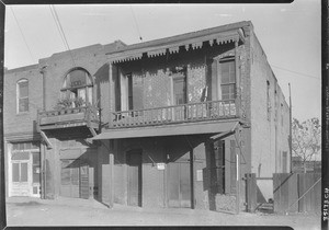 Exterior view of a "haunted house" on Juan Street, Chinatown, November 1933