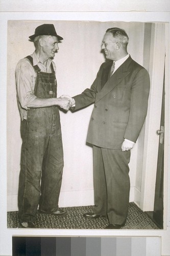 [Earl Warren shaking hands with a constituent during gubernatorial campaign.]