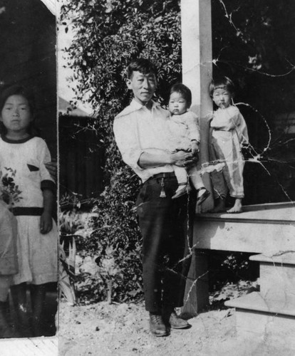 Korean American man and grandchildren