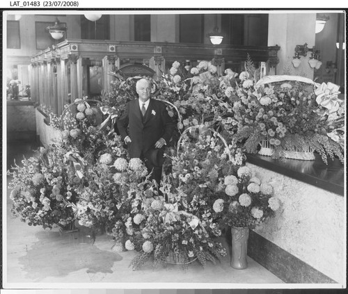 Harry Chandler surrounded by flowers on the occasion of the fiftieth anniversary of the Times