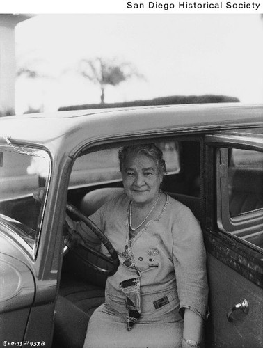Ernestine Schumann-Heink seated at the wheel of her DeSoto automobile at her home in Coronado