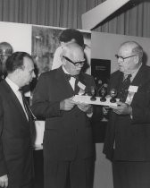 Dr. Lee de Forest (center), with Douglas M. Perham (right) and Joseph T. Cataldo