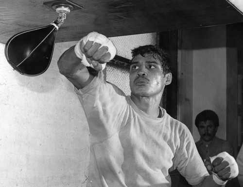 Arguello works on a speed bag