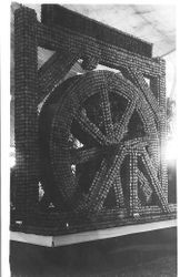 Circa 1915 Gravenstein Apple Show exhibit of a water wheel with the name "Sebastopol" in apples
