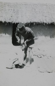 Shaving a Head, Malawi, ca. 1914-1918