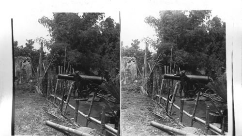 Gun and entrenchment captured from the insurgents at the Battle of the Zapote River. Philippine Islands