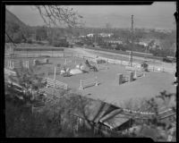 Prix des Nations jumps from the Olympic games set up in Griffith Park Riding Academy, Los Angeles, 1932