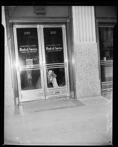 Bank window broken, 1954