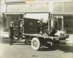 A. F. Tomasini accepting delivery of a DeLaval Milker in front of his store at 120 Kentucky Street, Petaluma, California in 1924