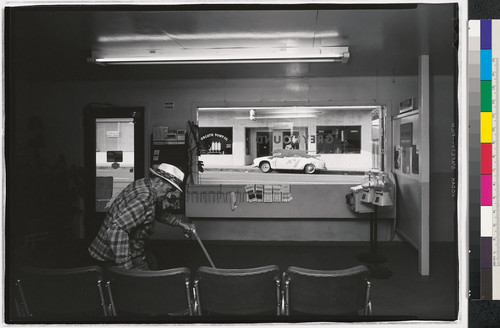[Man inside a Greyhound bus station, Arcata, California.]