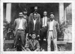 Photo of 7 in front of a house : unidentified young Korean men