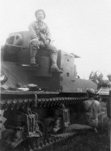 Son of Hahn Sidai on a tank in World War II