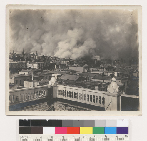 [Cityscape showing fire burning. From unidentified location.]