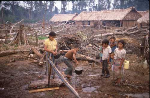 Guatemalan refugees at fountain, Chajul, 1983