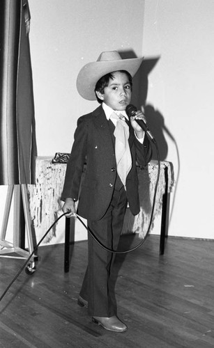 Latino boy singing, Los Angeles, 1986