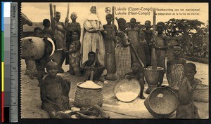 Missionary sister with children preparing manioc flour, Lukulu, Congo, ca.1900-1930