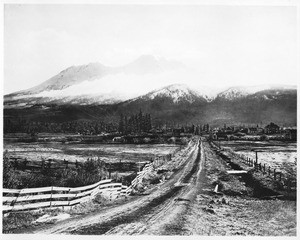 View of Mount Shasta with a white mist (or fog?) cloaking the upper portions, Siskiyou County, ca.1900