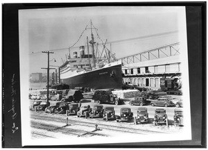 The Washington docked at Los Angeles Harbor showing cargo