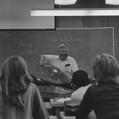 Richard H. Rosenblatt teaching an ichthyology class, showing an opah specimen, May 2, 1979