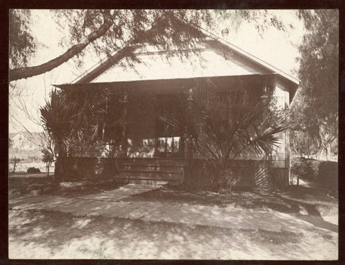 Mounted photograph of the Bird Family house called, ""The Bird Nest"" in Banning, California