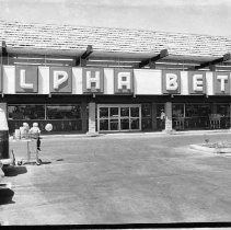 Exterior view of the Grand Opening of the Alpha Beta Supermarket at Hillsdale Blvd. and Walerga Road. Two stores opened at the same time