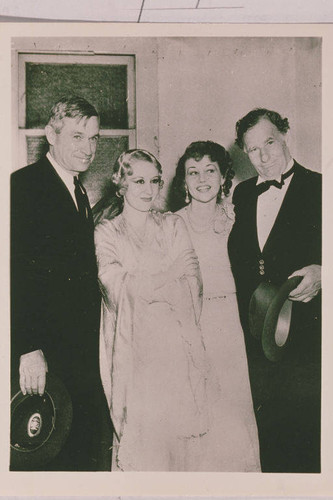 Portrait of Will Rogers, Paula Stone, her daughter and Fred Stone (left to right)