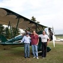 Airplane NC11490 with Al Blackburn. Donald Rolf, and Rolf's father